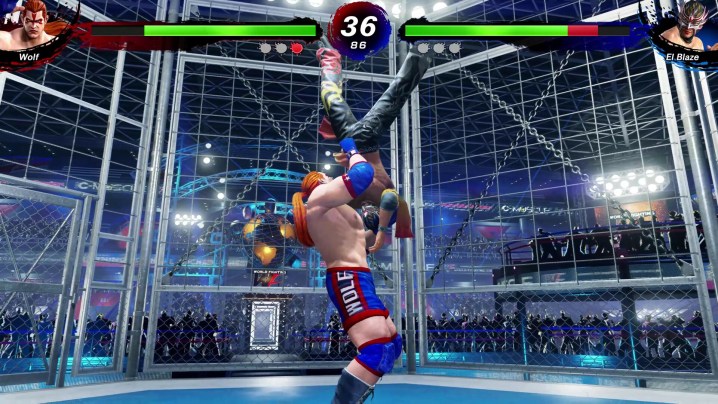 Wolf tient El Blaze dans Virtua Fighter 5: Revo