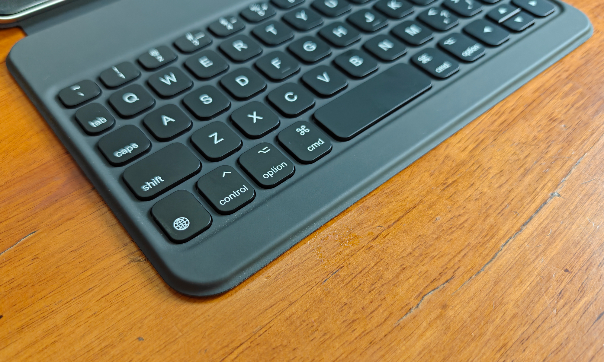 Vue du bouton de gros plan du clavier HOU pour l'iPad Mini.