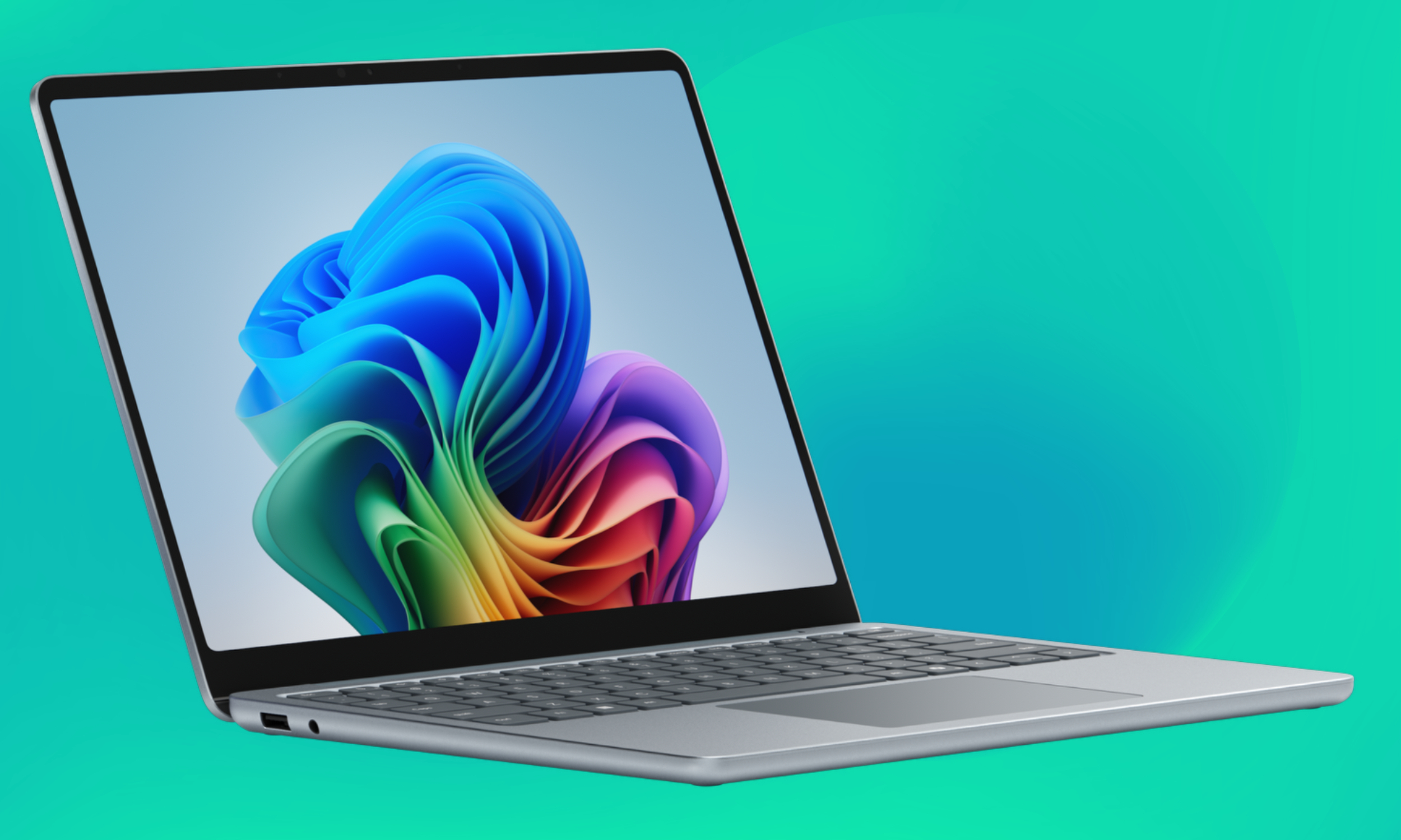 Microsoft Surface ordinateur portable de 13 pouces illustré en argent.