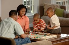 family playing board games