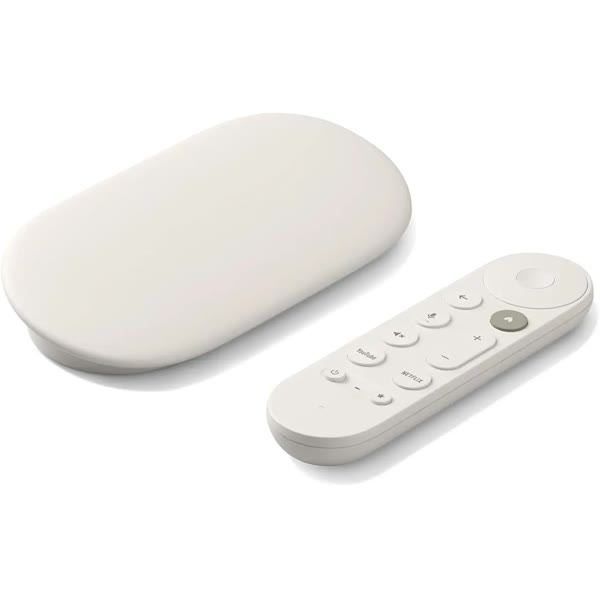 Boîtier Google TV Streamer blanc et sa télécommande